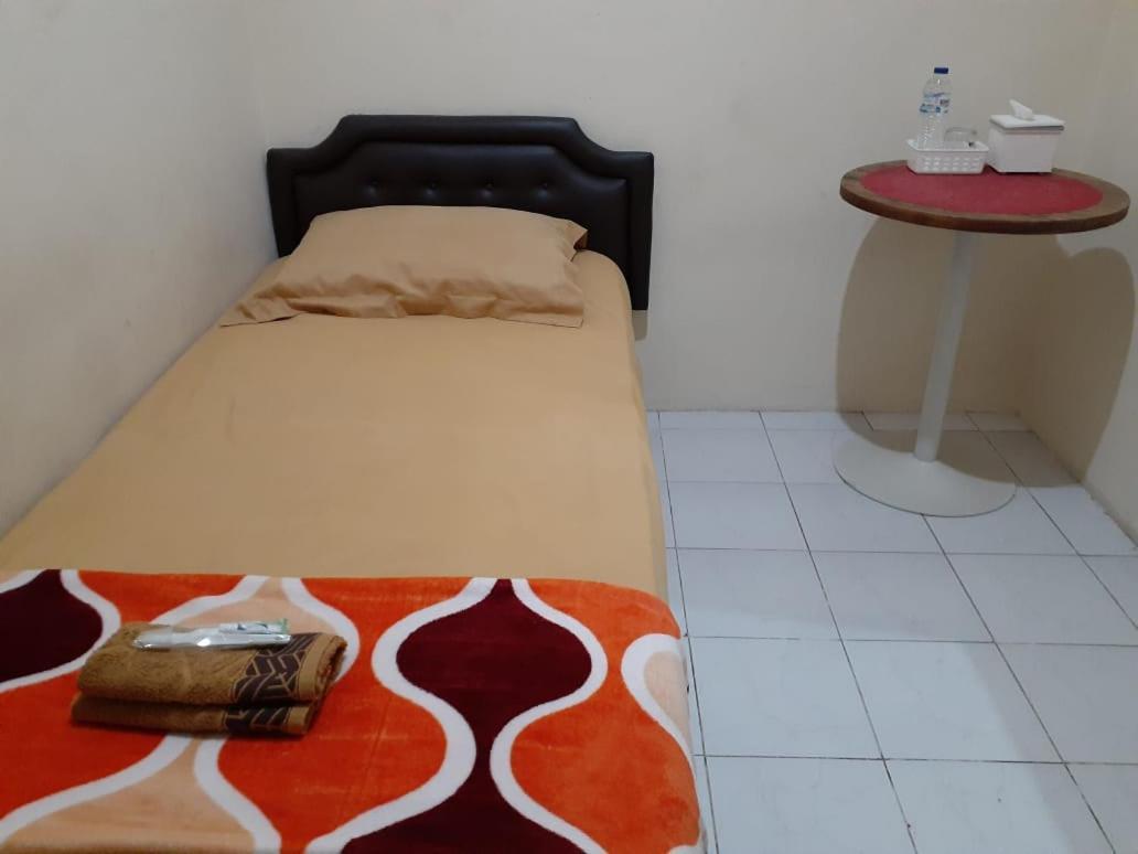 Hotel Kost Carmelia Syariah Baranangsiang 2*