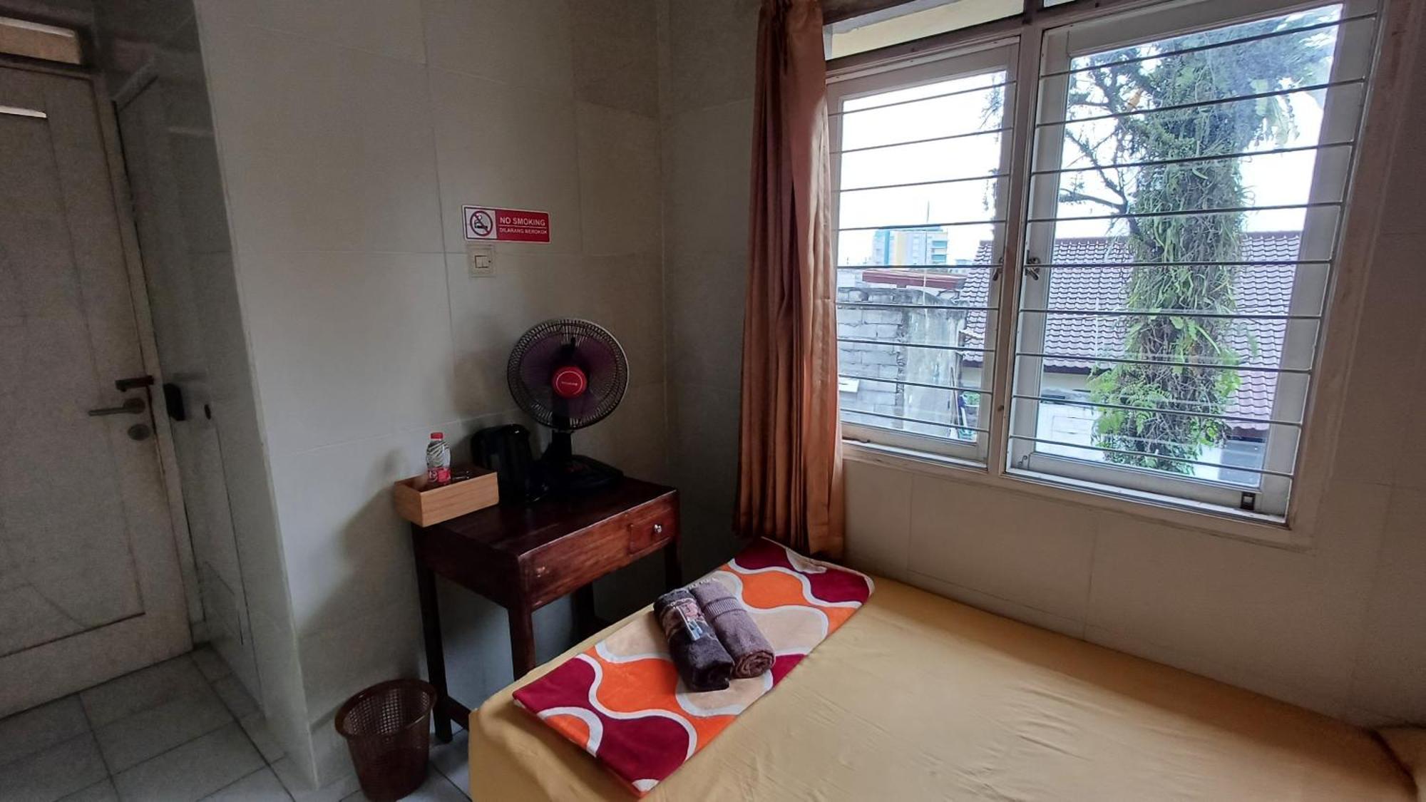 Hotel Kost Carmelia Syariah Baranangsiang